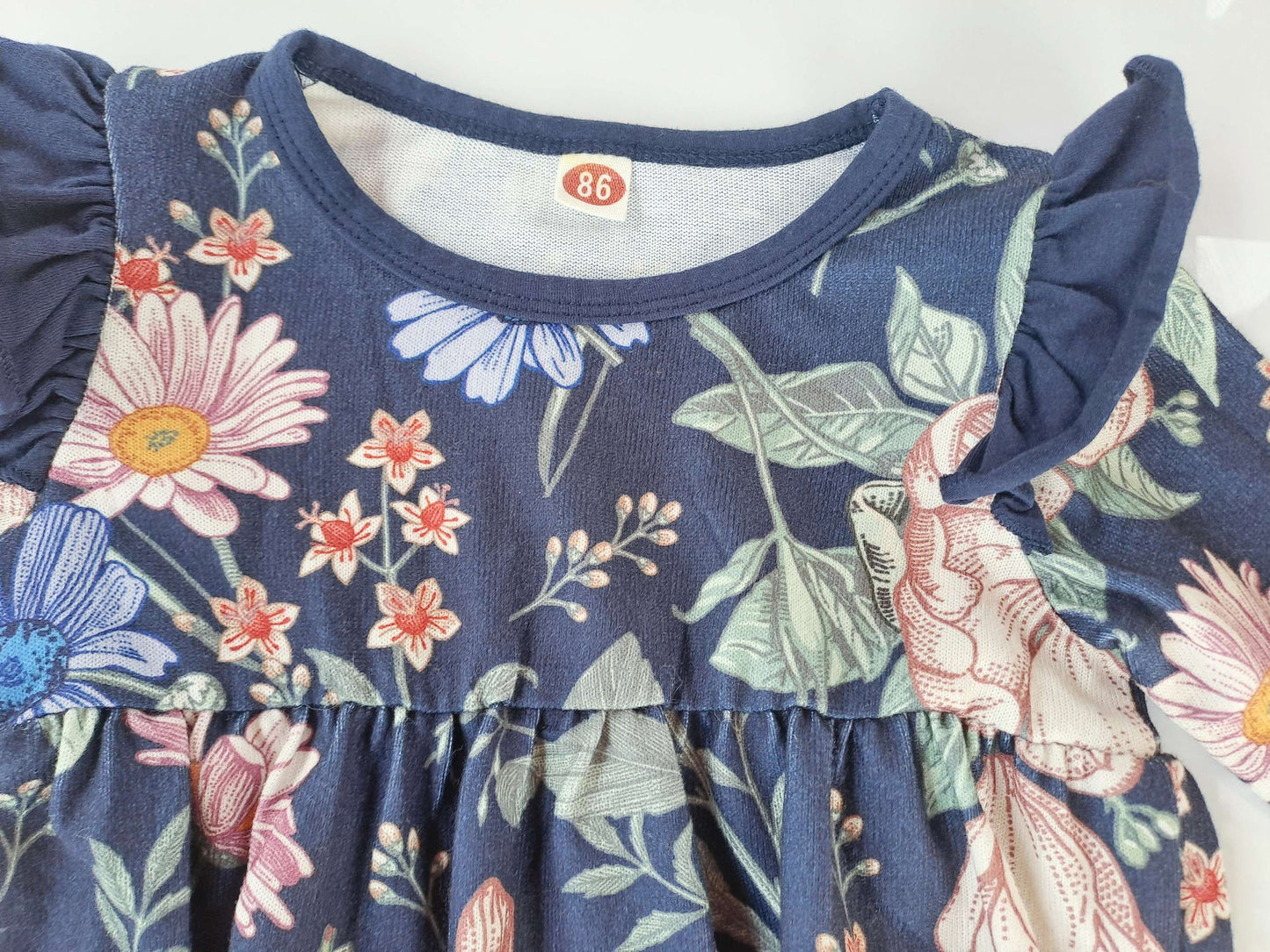 Mameluco manga larga floreado - Talla 12a18 meses